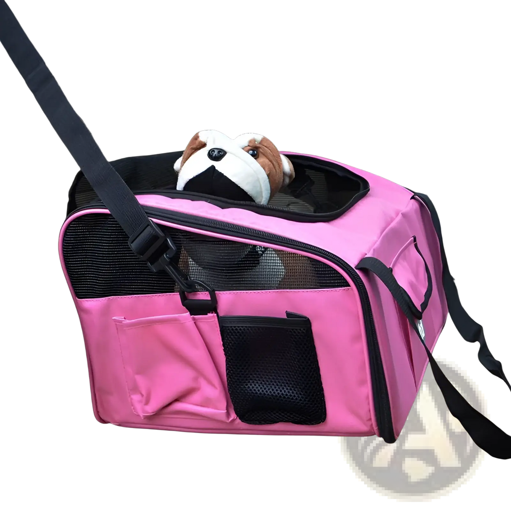 Pet carrier backpack for small dogs and cats in pink and black with mesh sides and a plush bulldog toy inside