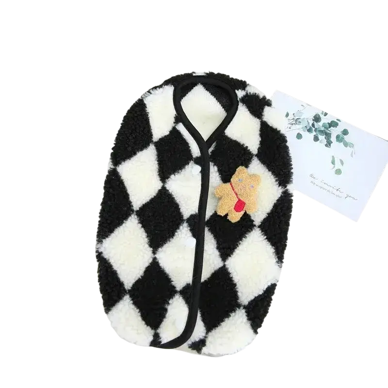 Black and white checkered plush baby bib with tan teddy bear appliqué as pet clothing fleece puppy jumpsuit plaid coat accessory