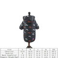 Black hooded puffer coat with white and orange dachshund pattern on mannequin for pet clothing use