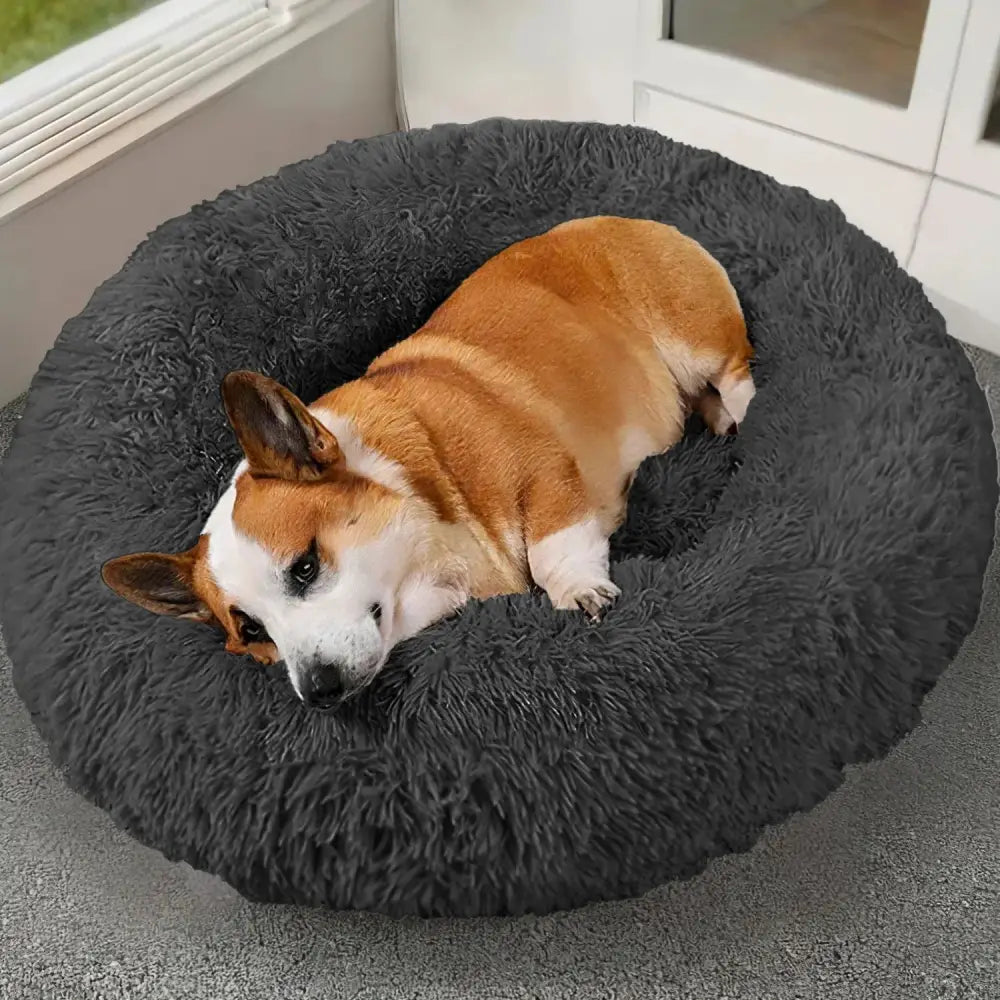 Soft plush dark gray circular fleece donut pet bed with fluffy texture for cats and small dogs