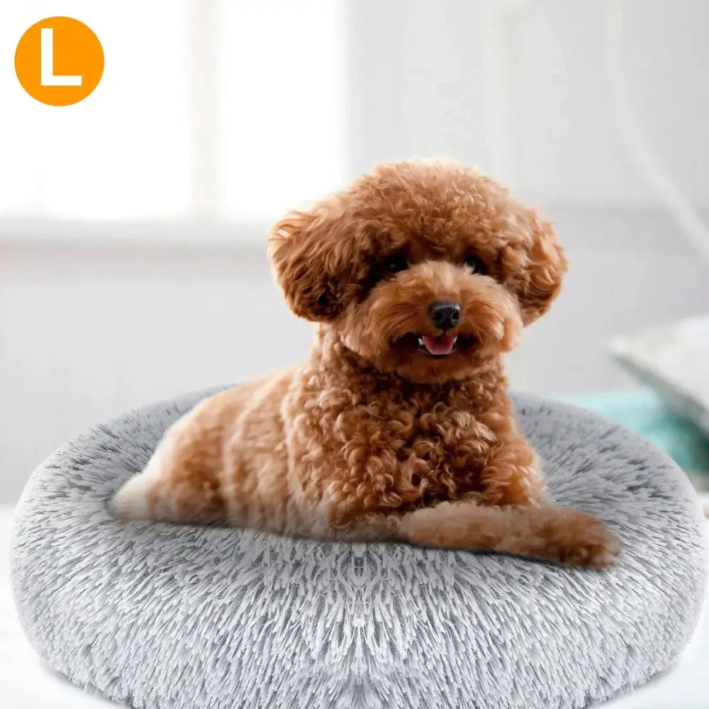 Plush fleece donut pet bed for cats and small dogs with soft gray fuzzy texture and subtle patterned design