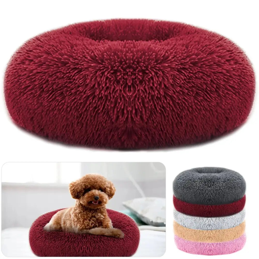 A plush fleece donut pet bed in deep red with a soft fluffy texture and cozy ringed design for cats and small dogs