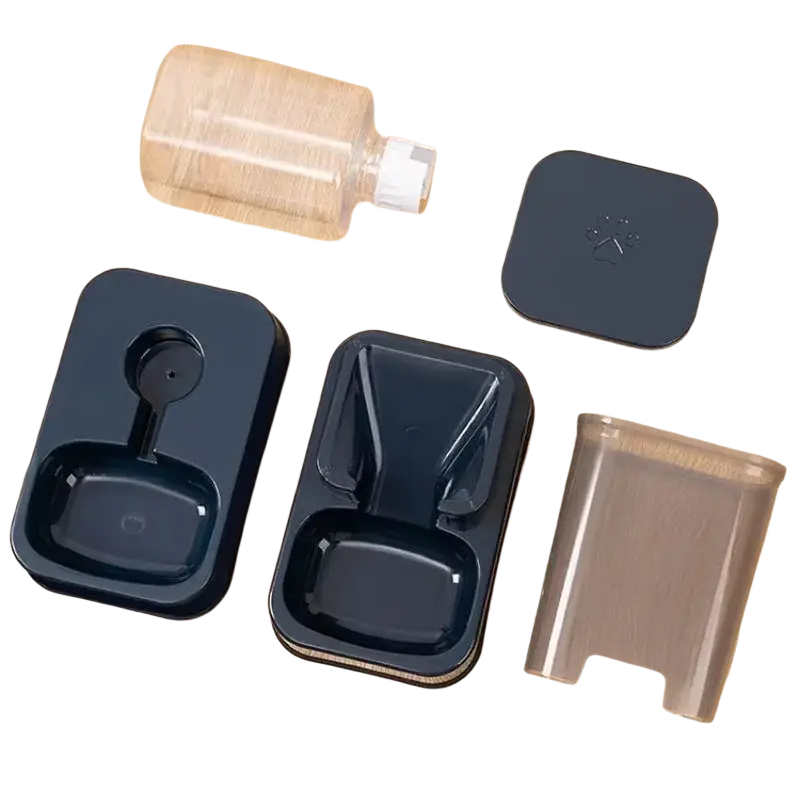Black plastic pet feeder and water dispenser with sleek design and dual compartments for food and water