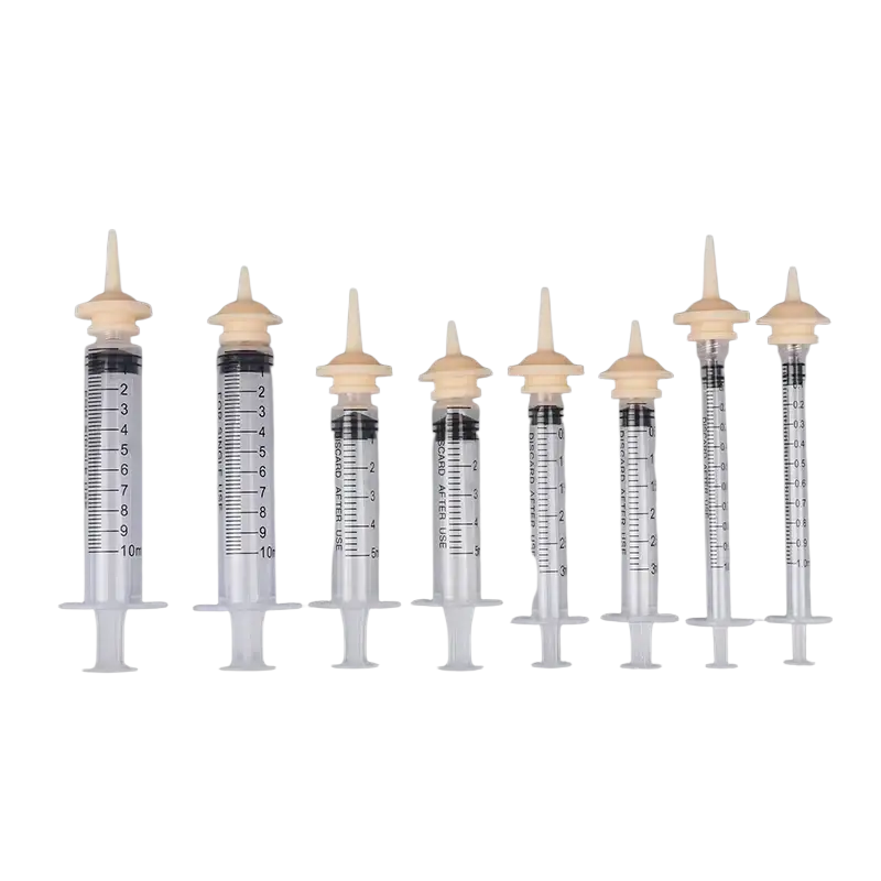 Clear plastic nasal spray syringes with beige caps and black markings in 3ml 5ml 10ml pet feeding syringe set