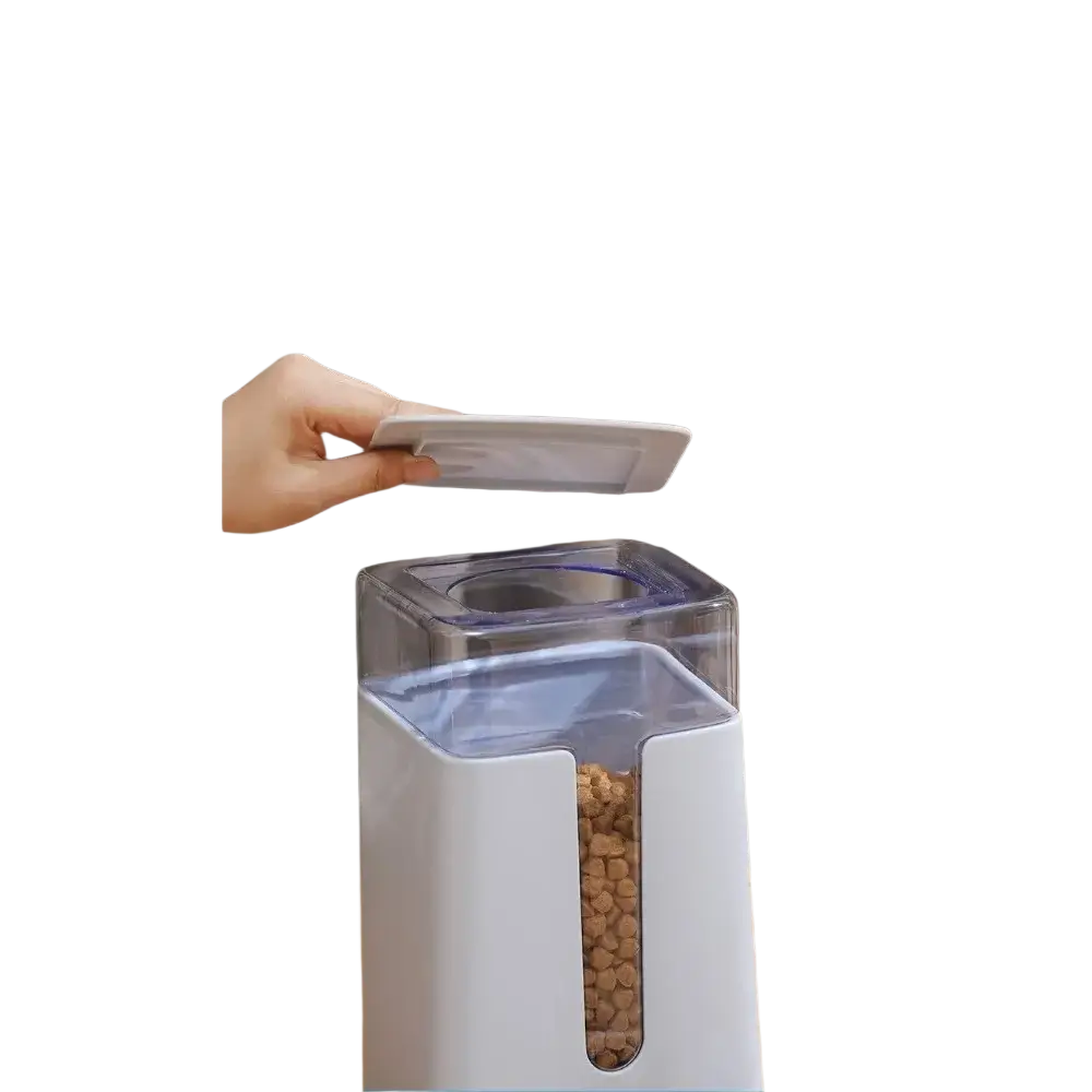 White plastic pet food dispenser with transparent front and blue lid filled with brown kibble 3.5l capacity