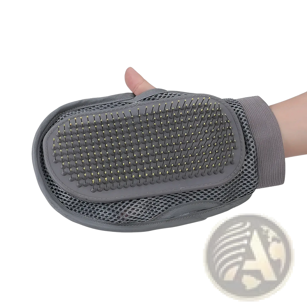 Gray silicone pet grooming glove with yellow-tipped flexible bristles and mesh fabric wrist strap for hair removal
