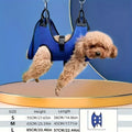 Blue mesh dog harness with black plastic buckles and adjustable straps for pet grooming hammock nail clipping helper