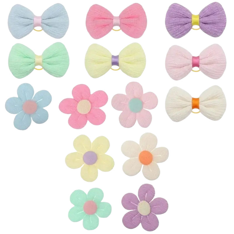 Pastel-colored pet hair bows with elastic attachment in mixed pastel colors featuring bow and flower shapes
