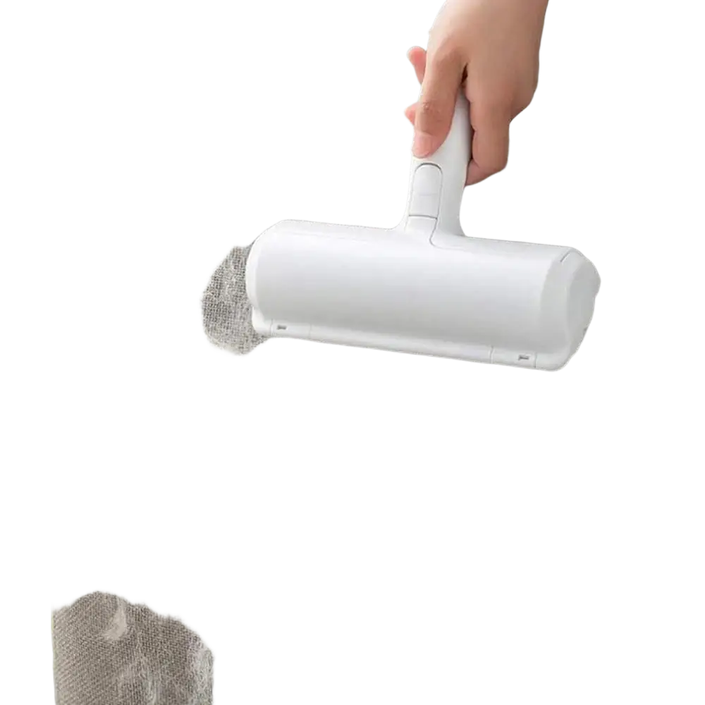 White plastic pet hair remover roller with cylindrical roller and ergonomic handle for cleaning furniture and carpets
