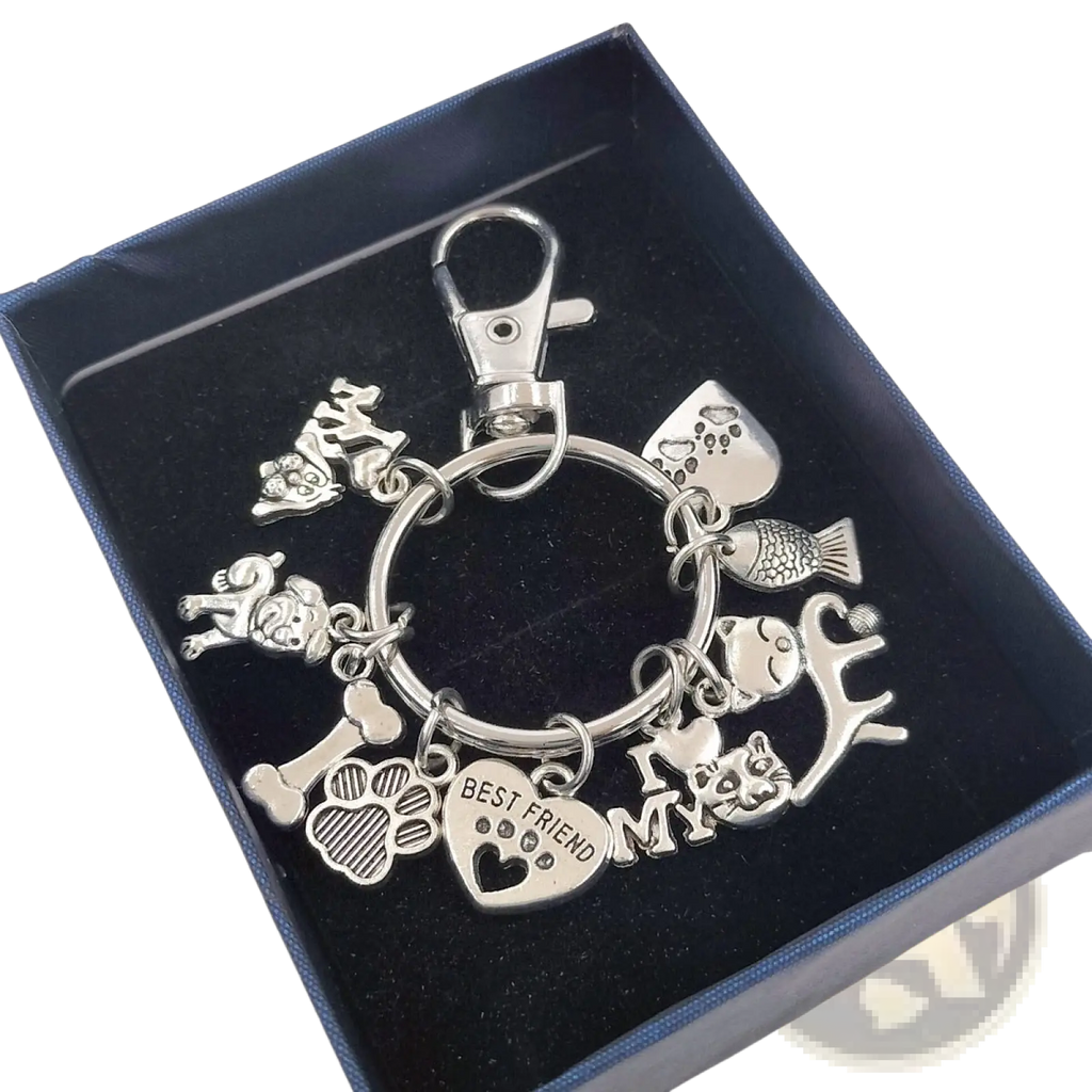 Silver pet lover charm keychain with multiple pet-themed charms and heart engraved best friend key ring