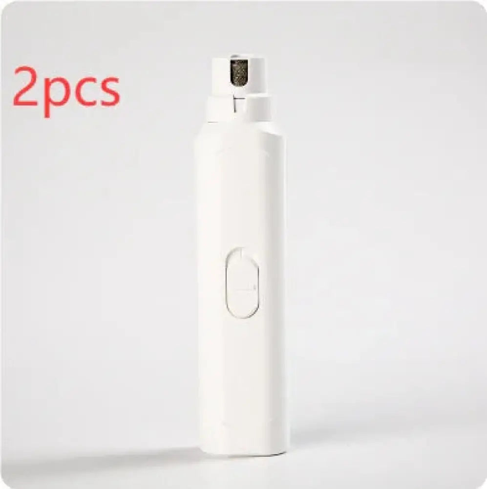 White electric pet nail grinder and trimmer with sleek ergonomic design and small oval button on the side for quiet use