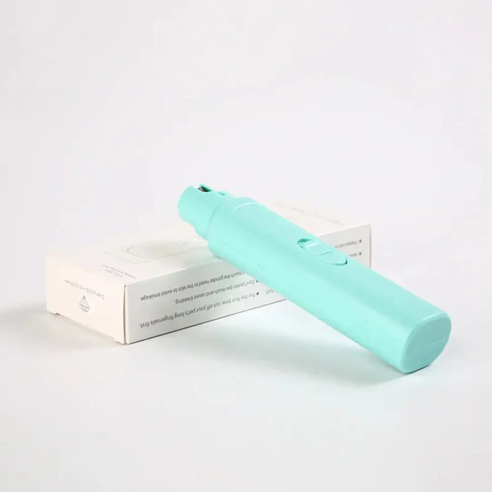 A sleek mint-green professional electric quiet pet nail grinder and trimmer with smooth plastic body and rounded edges