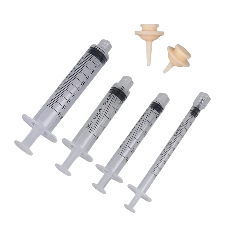 Clear plastic oral syringes 1ml 3ml 5ml with black markings white plungers and beige caps for pet feeding