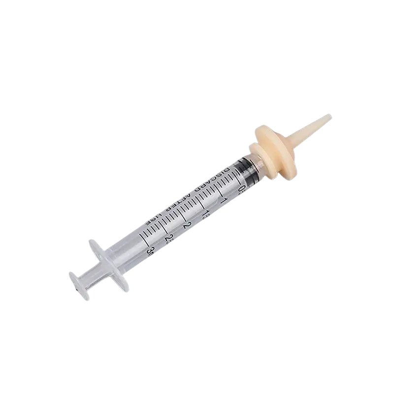 Clear plastic oral syringe with beige rubber tip and measurement markings 3ml size for pet silicone nipple feeder