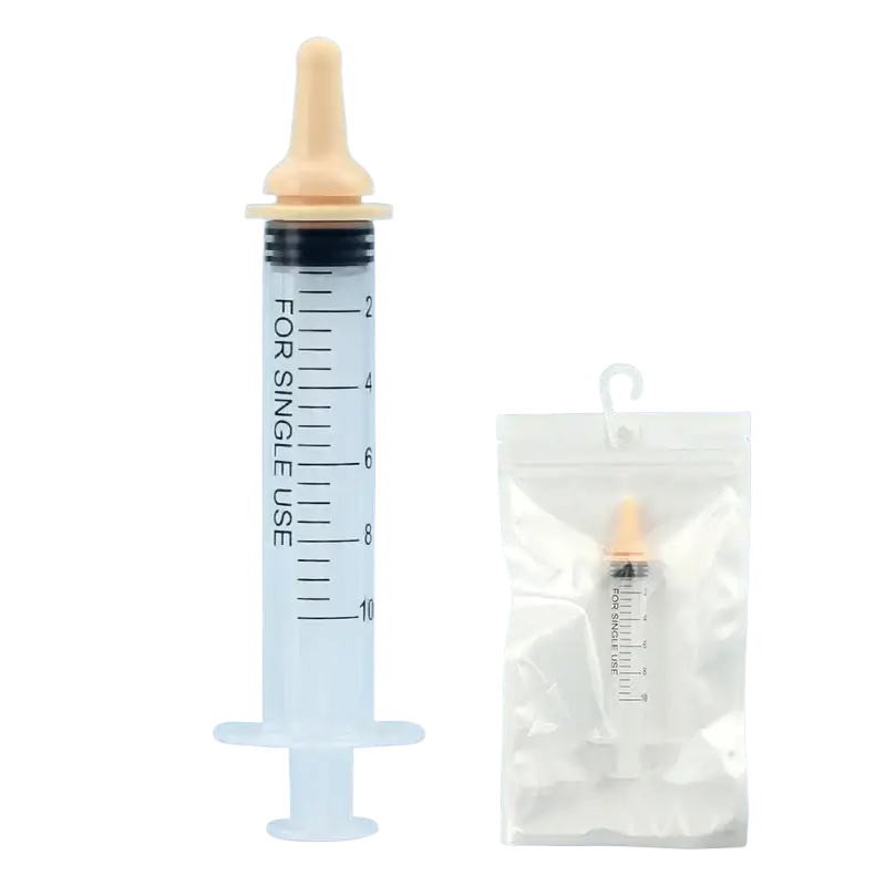 Clear plastic pet oral syringe with beige silicone nipple feeder and black plunger designed for single use