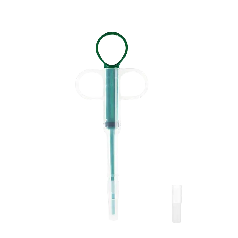 Green and transparent plastic pet pill dispenser with circular handle and replacement head for easy feeding