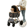 Pet stroller 66 lbs capacity black rose gold with black and bronze mesh and golden retriever puppy inside