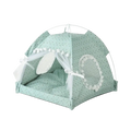 Mint green pet tent with delicate polka dot pattern, white mesh windows with pom-poms, and sheer curtains tied with bows