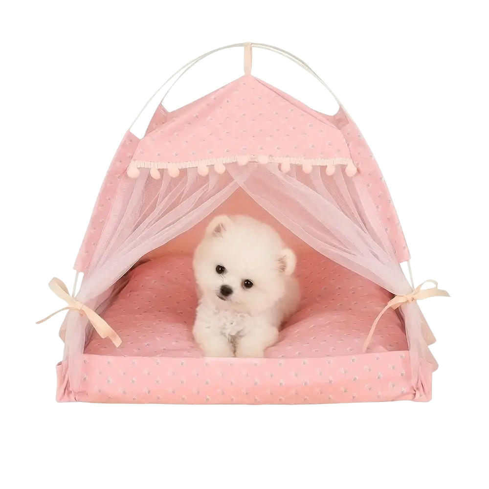 Pink polka-dotted pet tent with sheer mesh curtains and pom-pom trim for cats and dogs cave bed