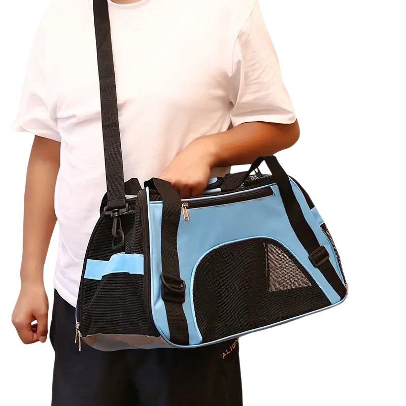 Light blue and black pet travel soft sided carrier with mesh sides and adjustable shoulder strap for comfortable space