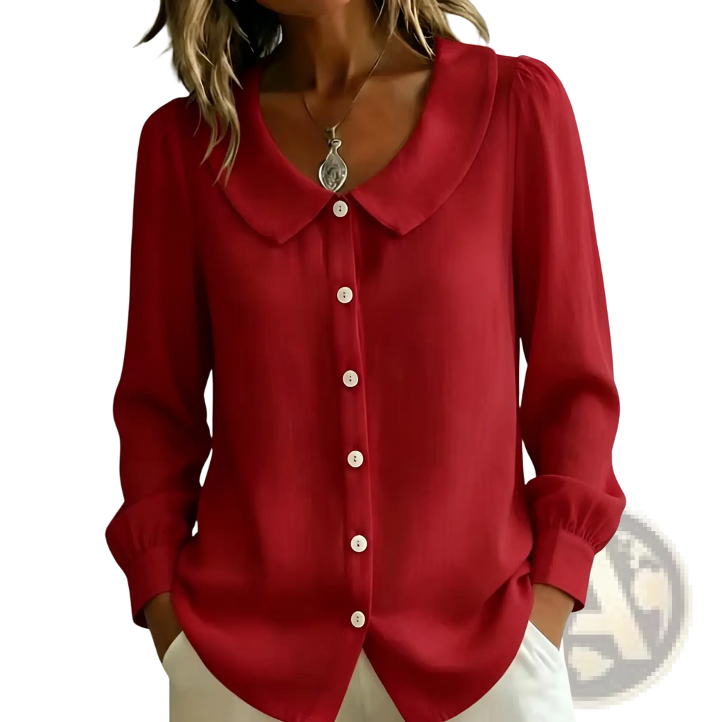 A vibrant red peter pan collar blouse with long sleeves and white buttons down the front for women