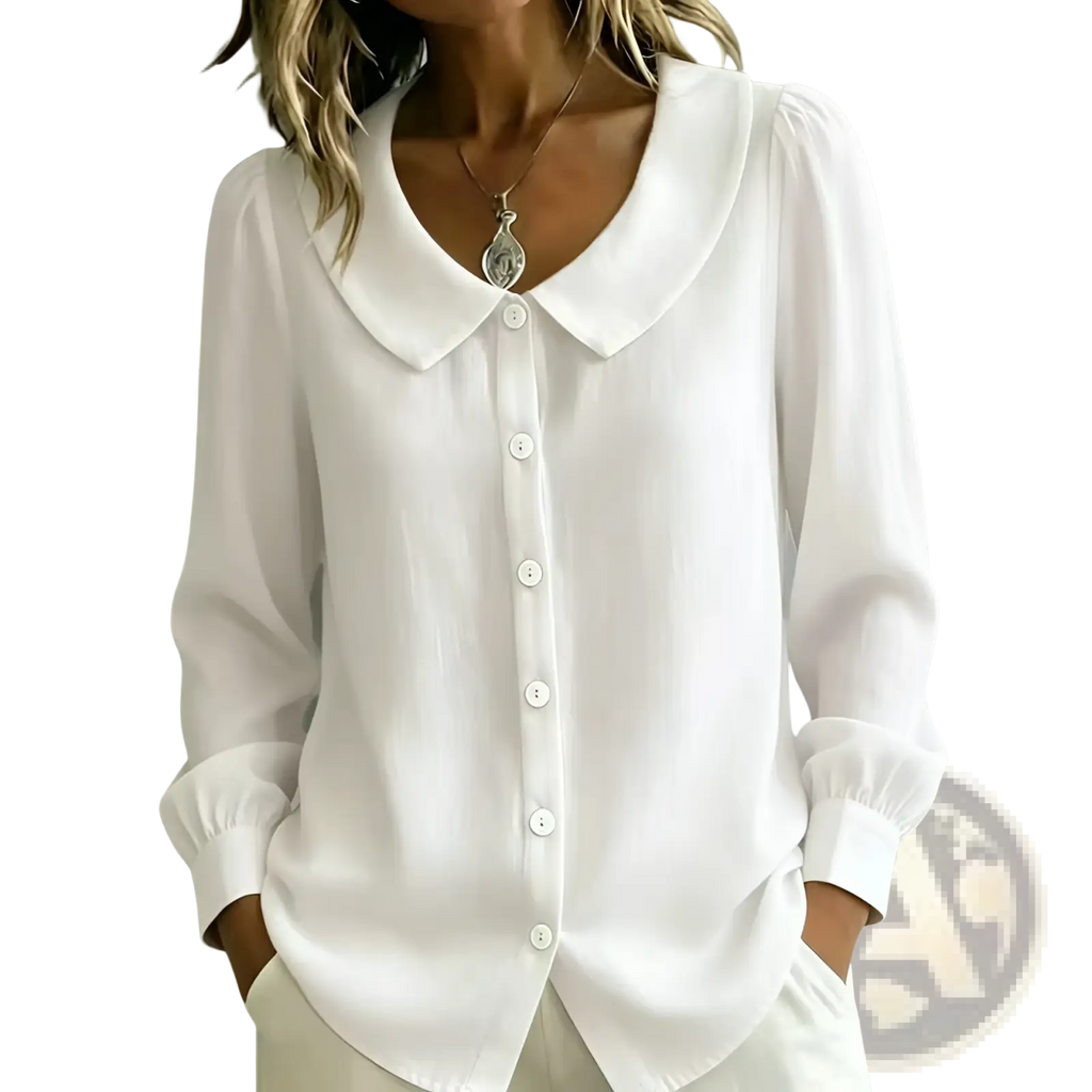 White peter pan collar blouse for women with soft flowing fabric and button down front top design