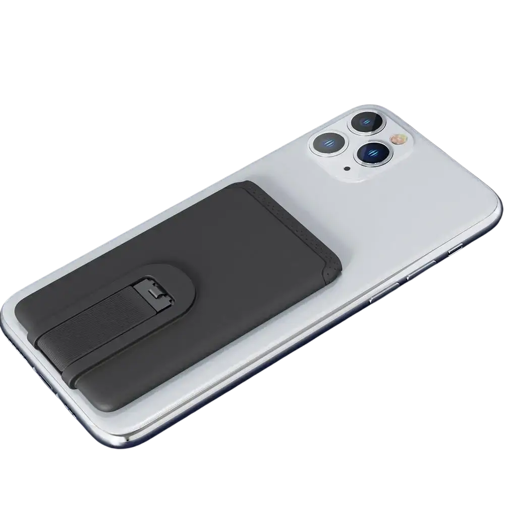 Black silicone phone card holder with sleek minimalist design attached to back of silver mobile phone