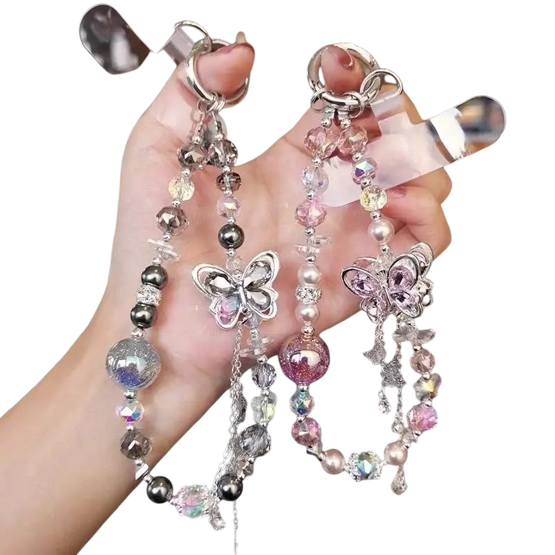 Two decorative phone chains with silver butterfly pendants and iridescent pink, clear, and metallic gray beads for mobile phone use