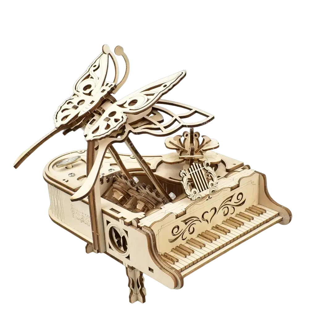 A light-colored wooden butterfly on a detailed mechanical piano music box 3d wooden puzzle diy assembly kit