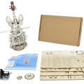 A delicately crafted white wooden violin music box with intricate winged floral cutouts from a piano music box 3d puzzle kit