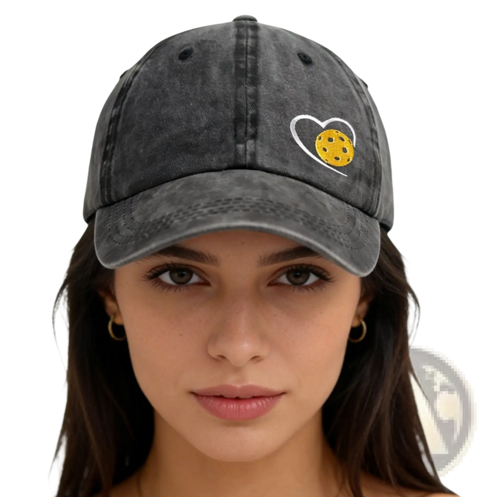 Dark gray distressed cotton baseball cap with white heart embroidery featuring yellow cookie design pickleball theme