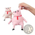 Pink piggy squeeze toy stress relief figurine with black eyes red tie and black feet ideal as a cute gift