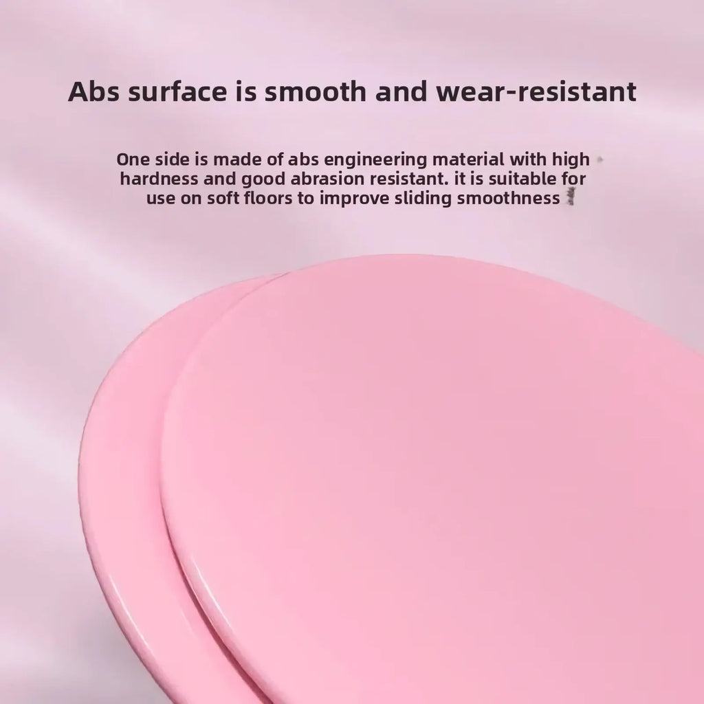 Pink circular abs plastic Pilates core slider with smooth wear-resistant surface for use on soft floors