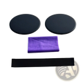 Pilates resistance band and sliding disc set featuring black circular discs and a purple fabric resistance band with black strap