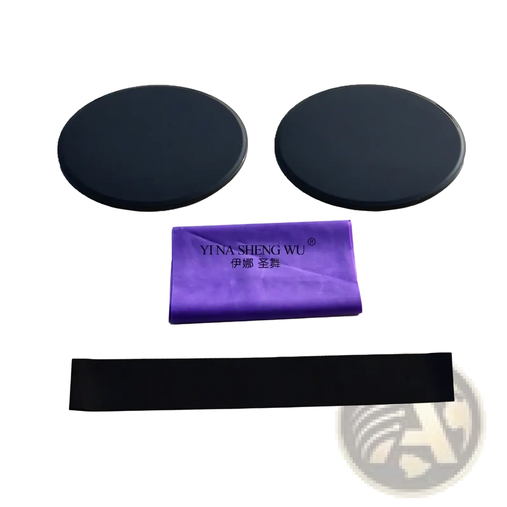 Black circular exercise discs with smooth matte finish and rounded edges in pilates resistance band and sliding disc set