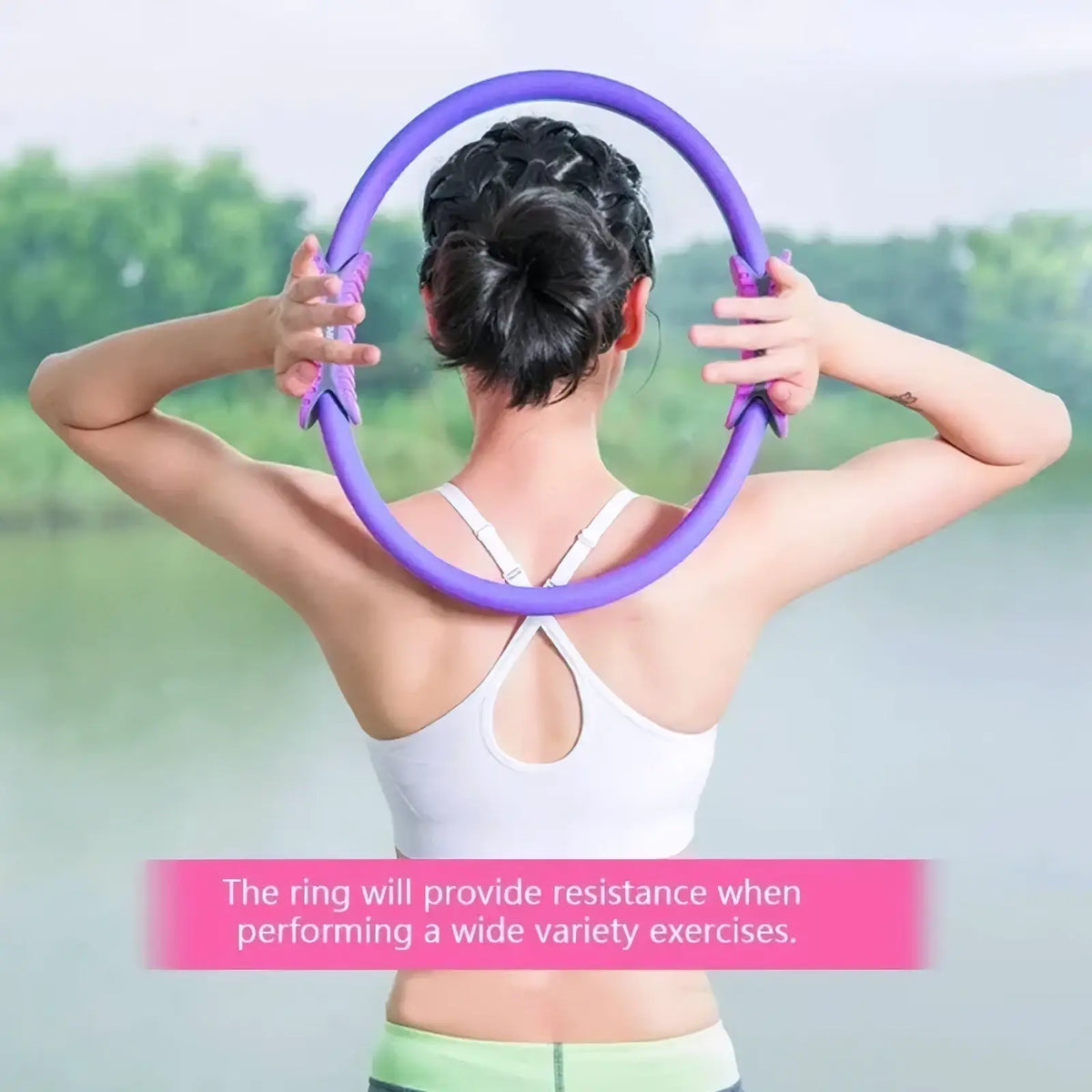 Purple pilates ring dual grip exercise circle with soft flexible material and padded handles for resistance training