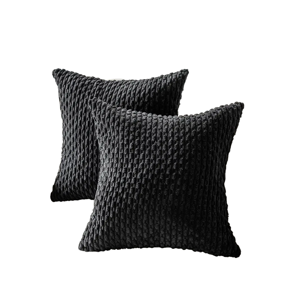 Black textured throw pillows with chunky knit pattern on cream sofa complement home decor with cushion cover style