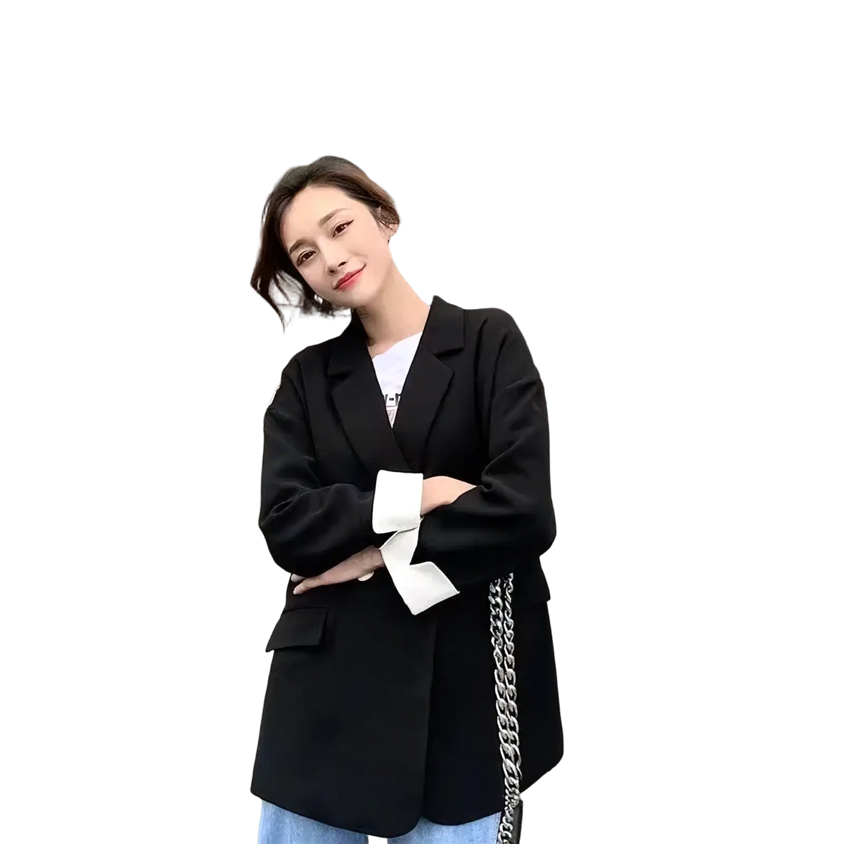 Black blazer with white cuffs and chain strap detail showcasing a stylish contrast for formal occasions