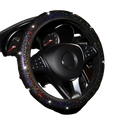 Black steering wheel cover adorned with sparkling rainbow glitter from the pink bling steering wheel cover set
