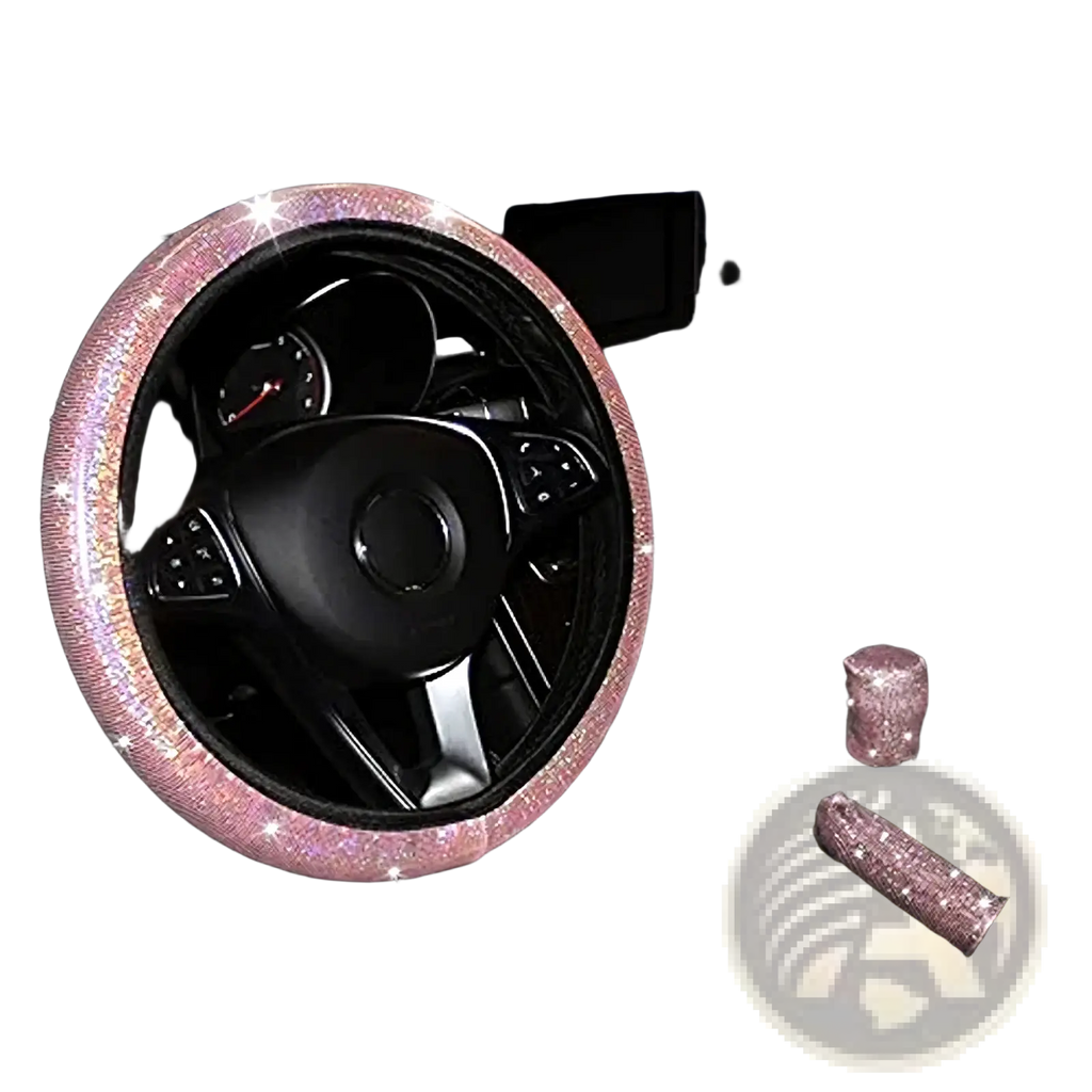 Pink bling steering wheel cover set featuring a pink glittery steering wheel cover with matching gear shift knob and handbrake handle