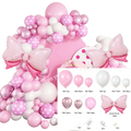 Pink bow balloon arch kit featuring pink and white polka-dotted balloons with metallic rose gold accents for party decoration