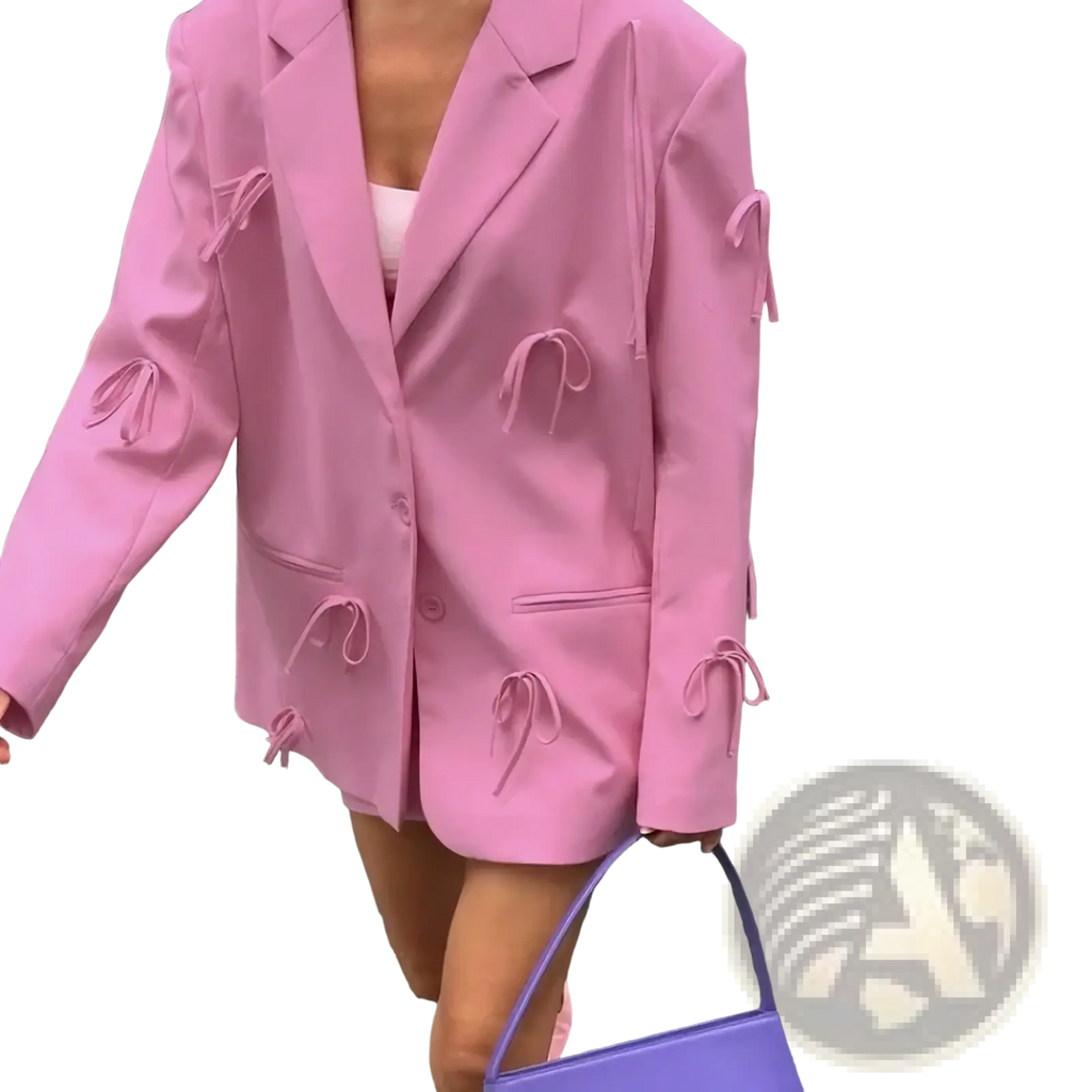 A vibrant pink bow Y2k blazer jacket with matching tie details on sleeves and front made from smooth fabric