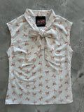 White sleeveless cotton blouse with red bow print and matching neckline bow by retro lifestyles brand