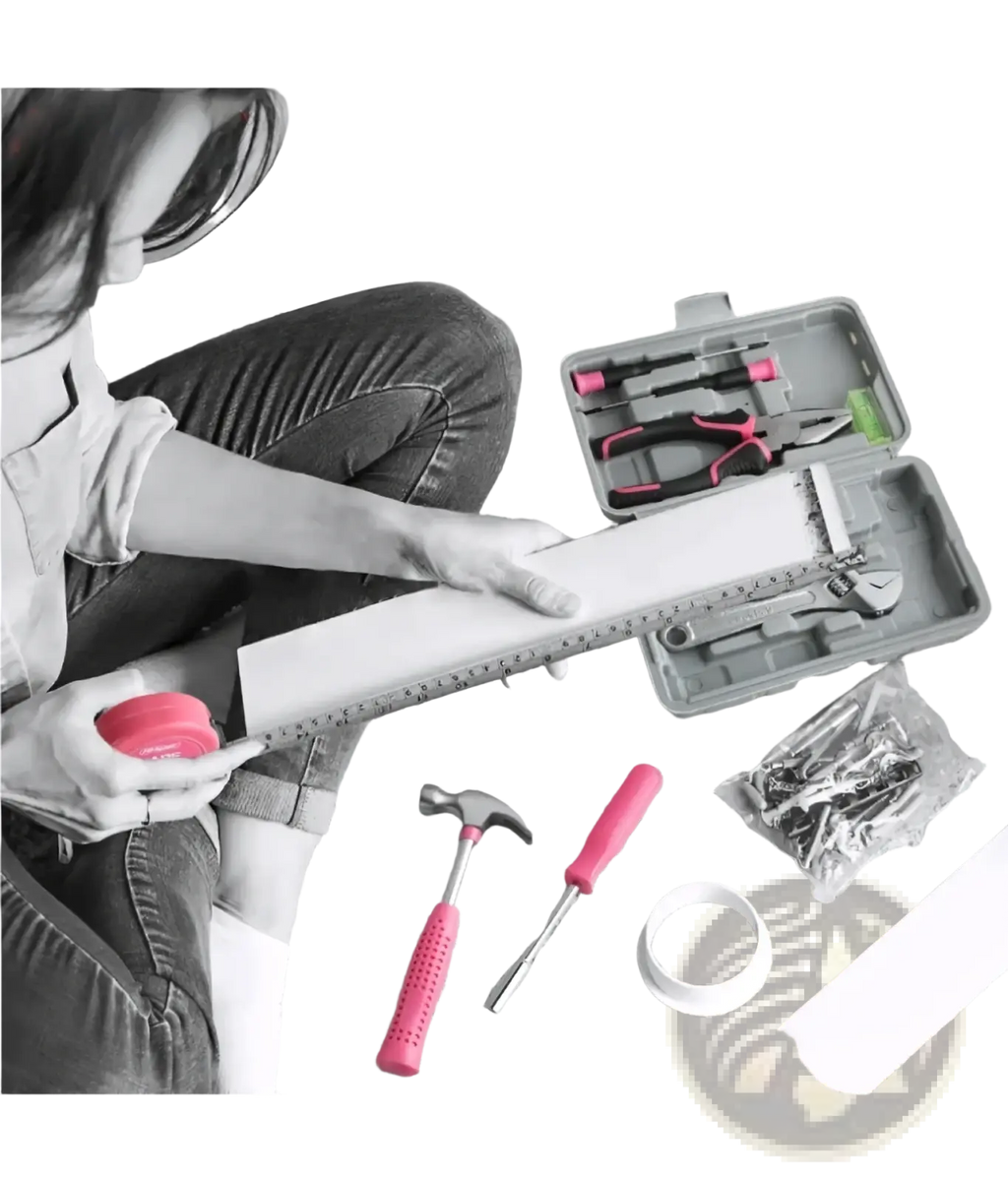 Pink diy tool kit with ergonomic pink-handled hammer and screwdriver set for home maintenance on carpeted floor