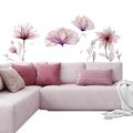 Pastel pink sectional sofa with plush velvet upholstery and coordinating mauve rose and beige decorative pillows