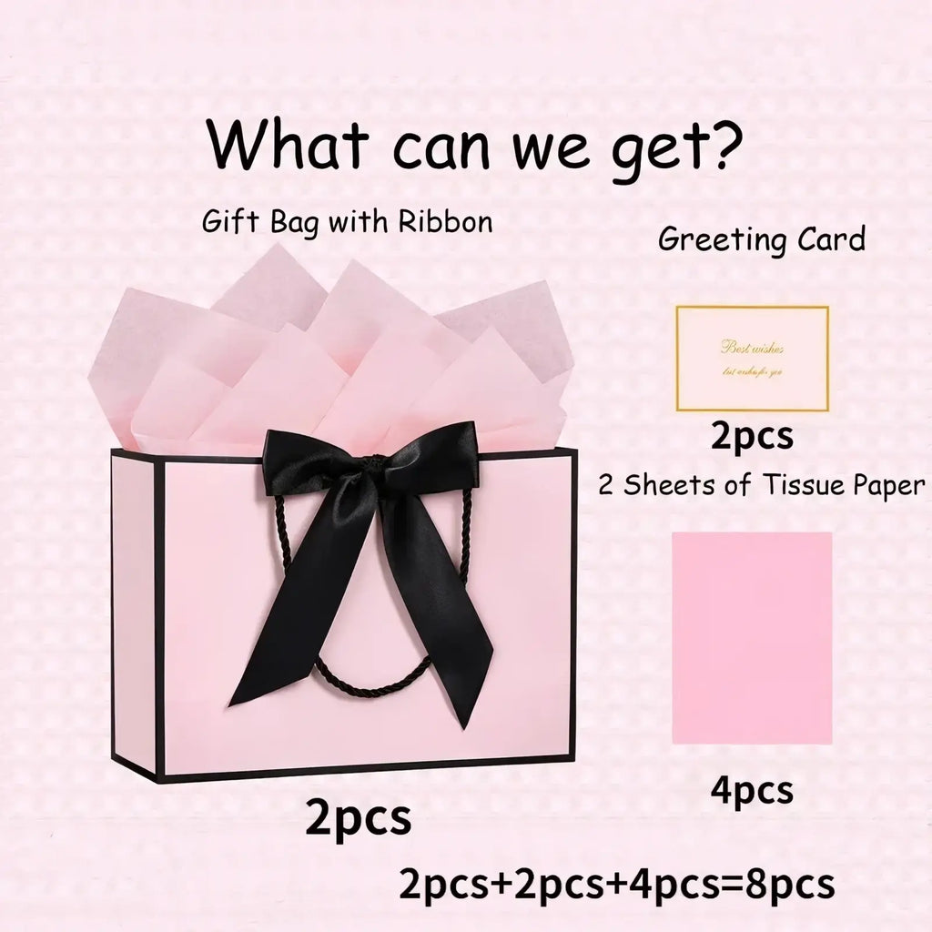 Pink gift bag with black satin ribbon bow featuring a sleek design from the pink gift bags with bows and cards set