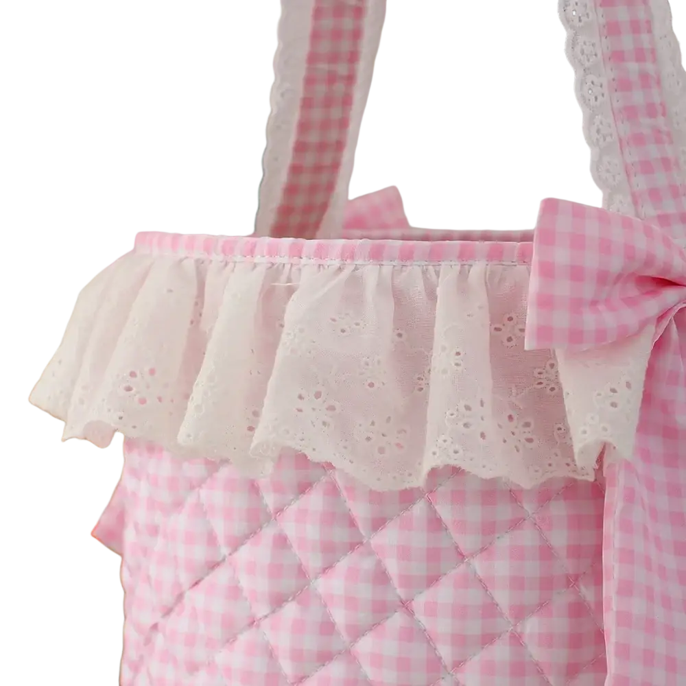 Pink gingham Easter basket with quilted fabric lace ruffle trim and matching bow for decorative use