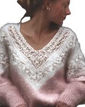 A soft knitted pink gradient lace v-neck sweater with intricate lace detailing around the neckline