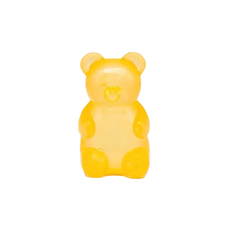 A translucent yellow gummy bear sensory fidget toy with a smooth glossy surface and rounded features