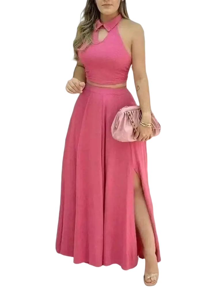 Pink halter two piece set featuring a collar closure and cutout halter top paired with a flowing maxi skirt with high slit